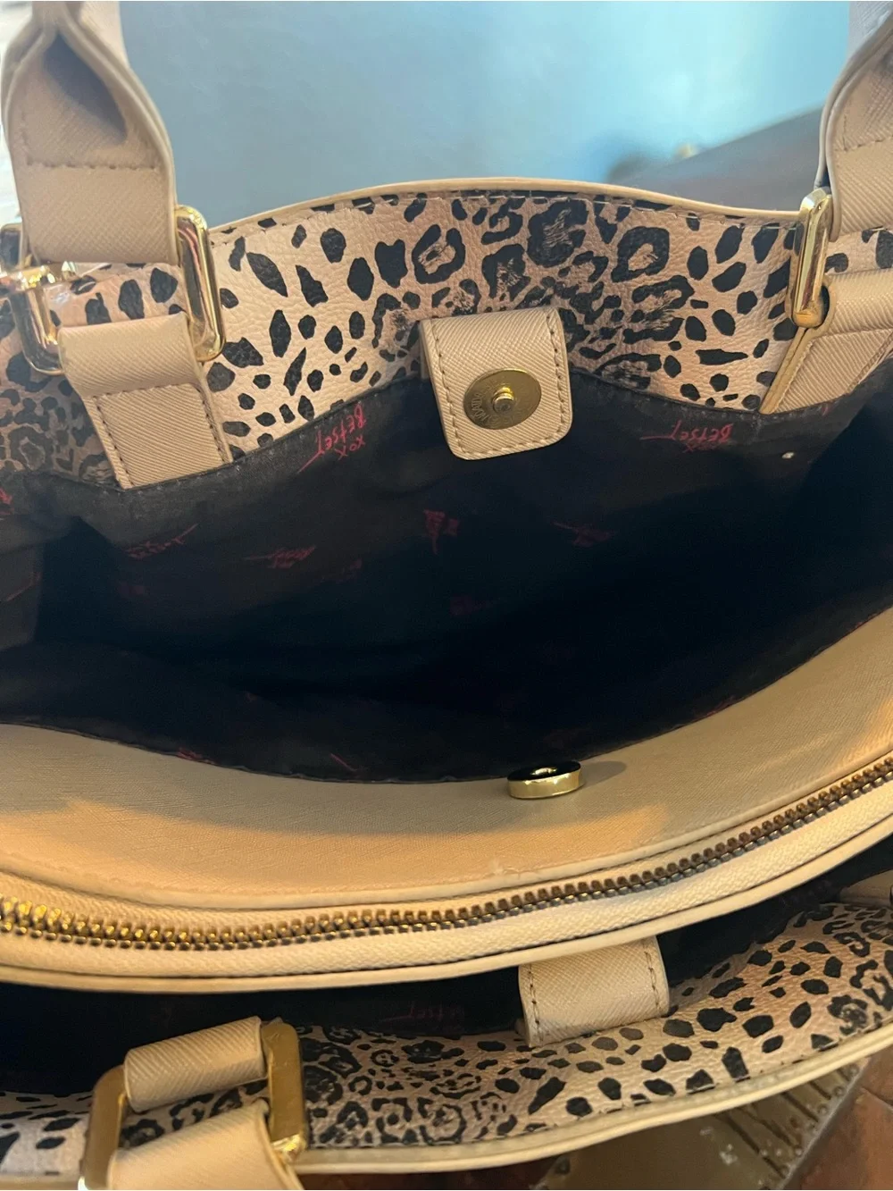 Betsey Johnson satchel handbag featuring an embossed heart pattern
